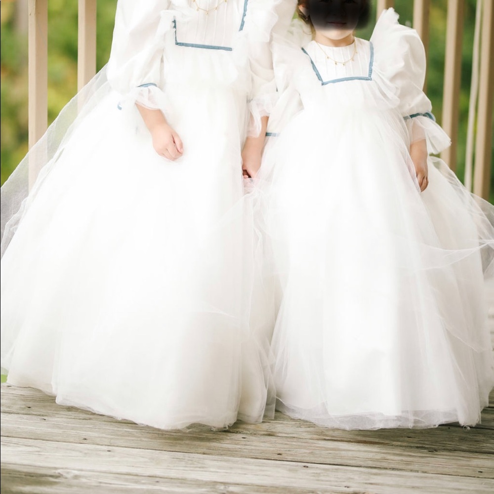 White with light blue trim tulle gown